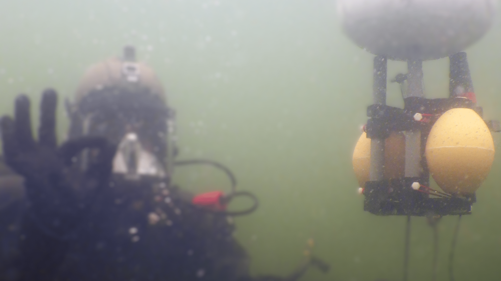 A Dutch Navy diver deploying a Buoyant Mine Attachment (BMA) against a target