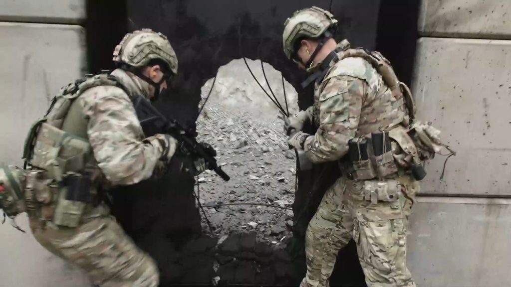 Operators gain access through a breached wall